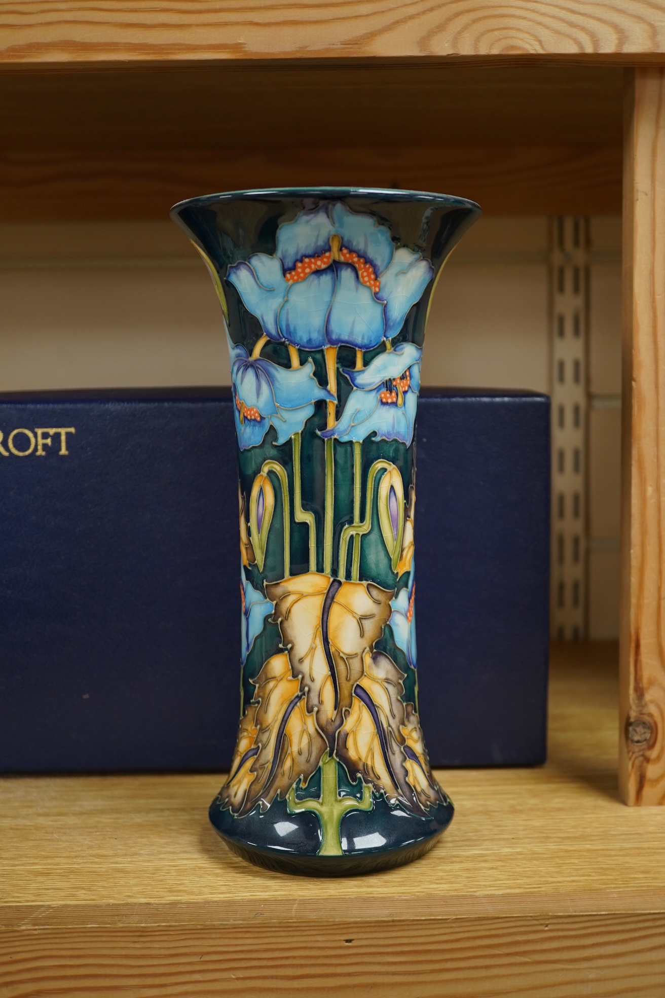 A Moorcroft ‘Blue Rhapsody’ vase, designed by Philip Gibson, 2001, created for the collectors club. Boxed. 26cm tall.